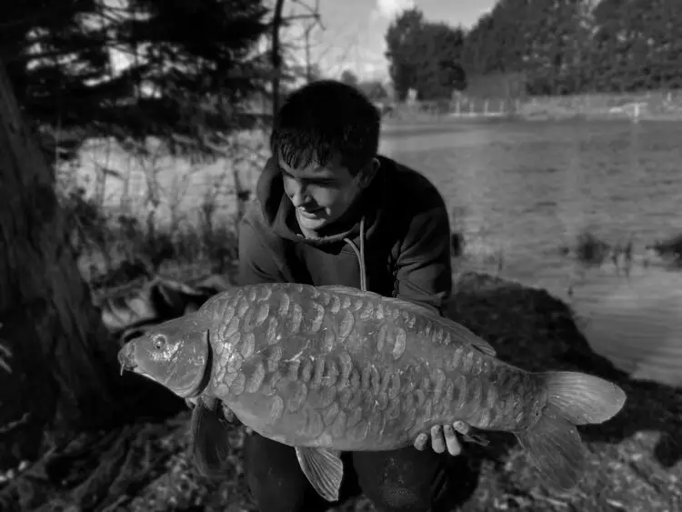 Kayden with his new PB mirror card - a black & white version