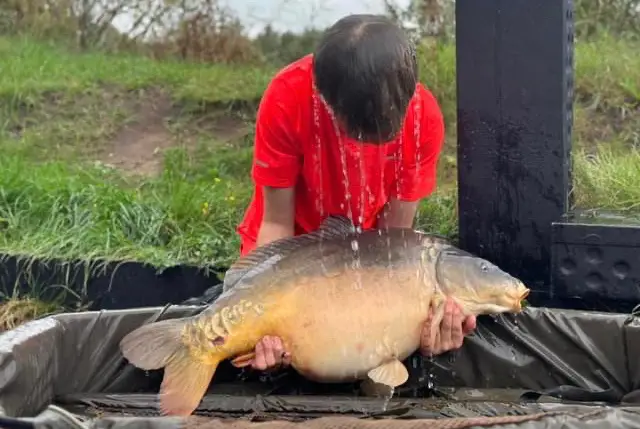 Harvey gets a bucket for his new PB Carp