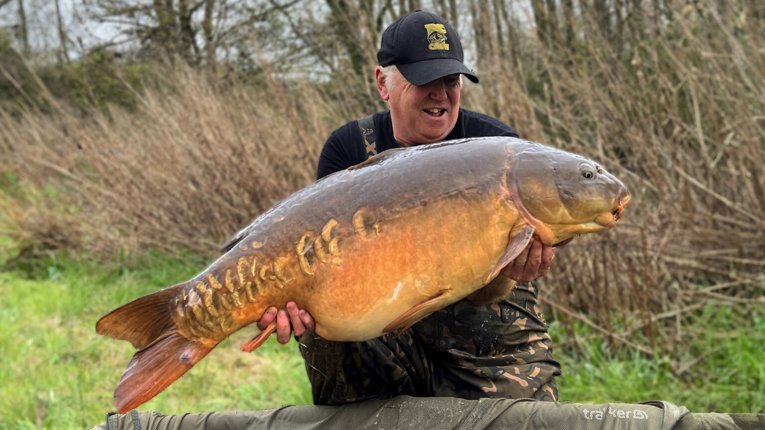 Darren with his PB mirror carp